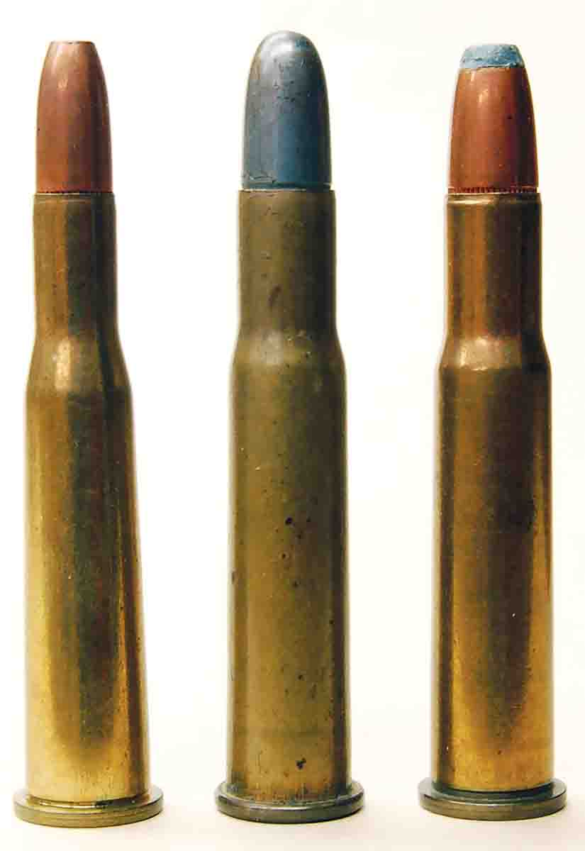 Left to right: an early .25-35 Smokeless with 117-grain full patch bullet, an WRA CO .30 WCF Smokeless with its first bullet and a 160-grain full patch roundnose. A flatpoint bullet was not seen until after World War II.